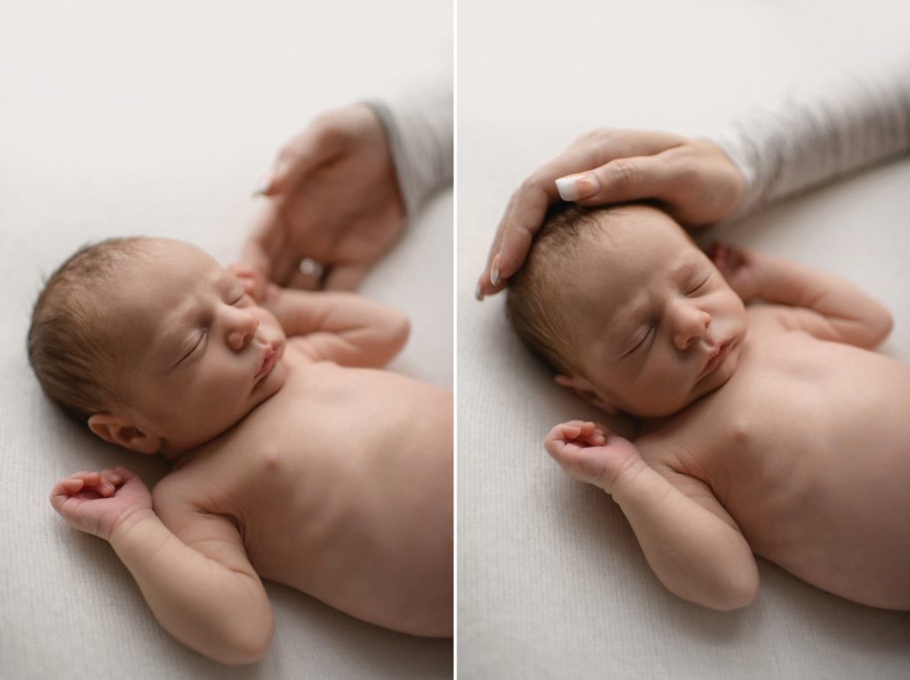 relaxed newborn pose with mom's hand