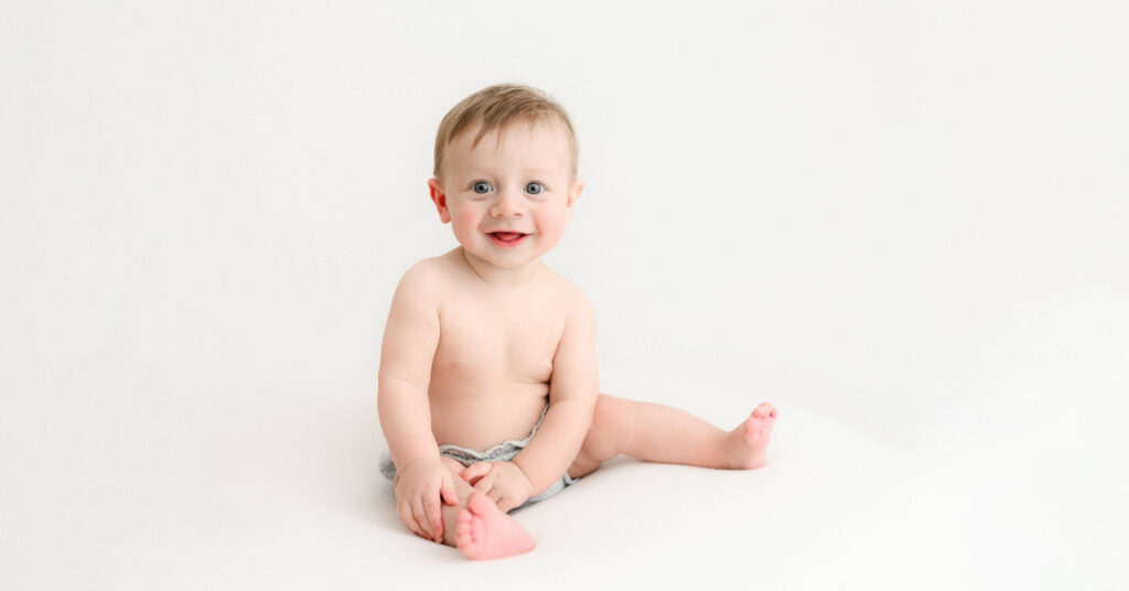 sitter session for baby who just learned to sit up on his own