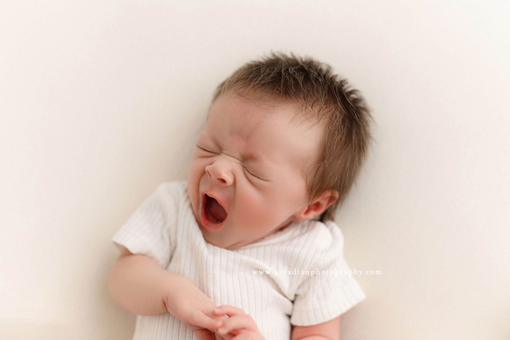 yawning newborn
