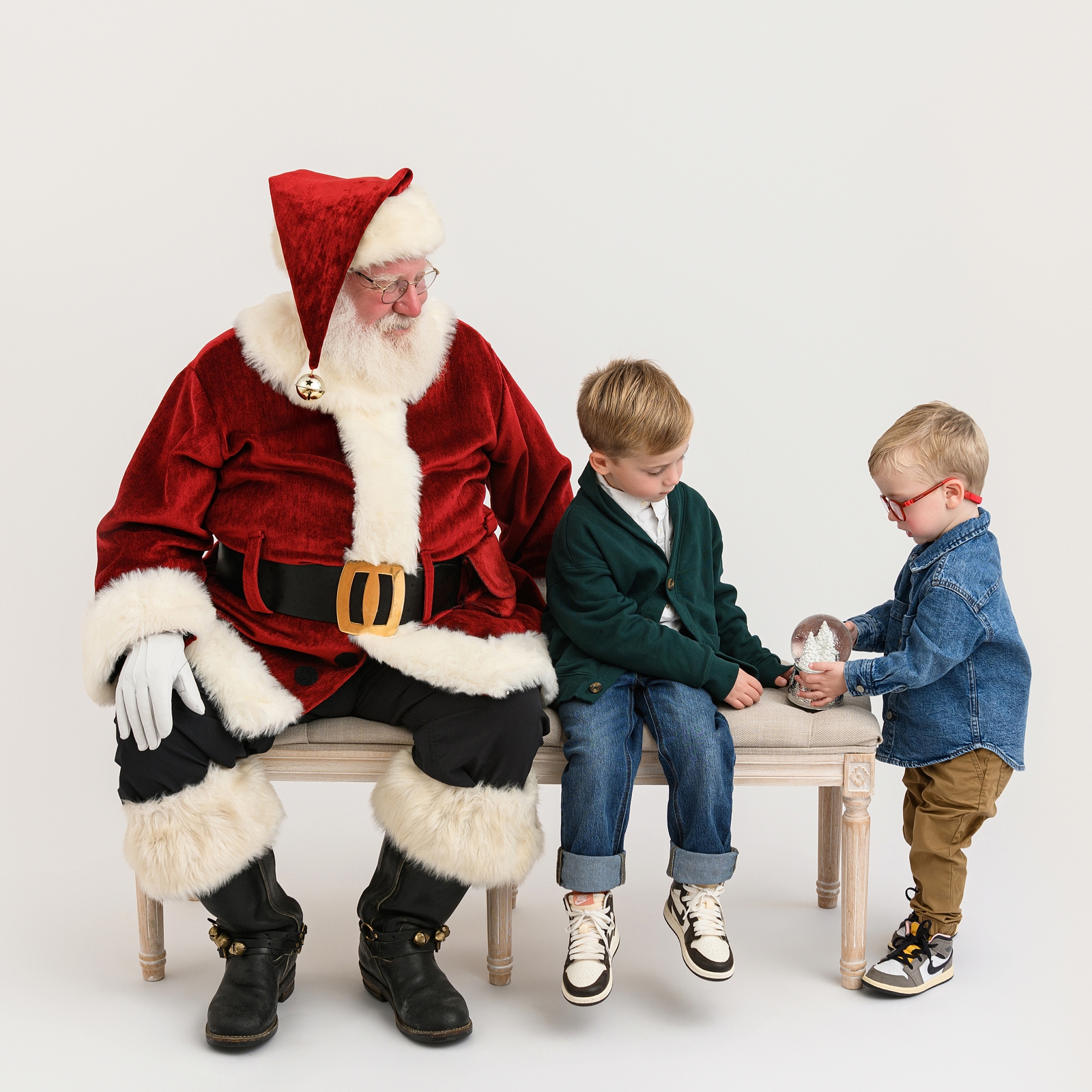 Boys wearing timeless holiday outfits for Santa photos.